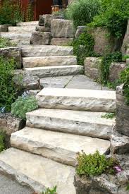 Owen Sound Natural Stone Slab Steps And Landings Armour Boulders With Planted Gardens Landscaping With Boulders Landscaping With Rocks Backyard Landscaping