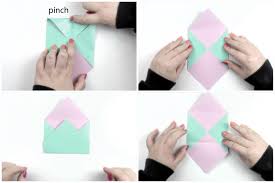 Fold the sides of the paper inwards. How To Make An Easy Origami Envelope