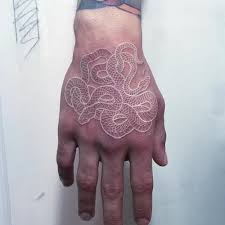 6.1 white ink tattoo designs for men. Serpentine Tattoos That Weave Black White Ink By Mirko Sata Colossal