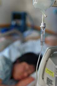 Medication Iv Drip With A Female Patient Lying On The Bed In The Background Affiliate Drip Female Medication Brain Injury Glasgow Coma Scale Glasgow