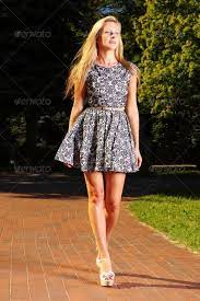Discover images and videos about beautiful girls from all over the world on we heart it. Fashion Young Woman In Summer Dress Relaxing In Park Summer Dresses Young Fashion Dresses