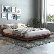 Simple yet durable, our marcus queen size platform bed will transform any bedroom with its graceful design and style. Platform Bed Buy Latest Platform Bed Designs In India Urban Ladder