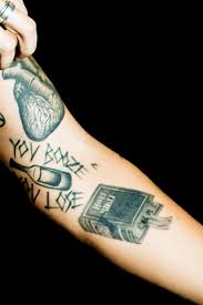 In the united states there is no federal law regulating the practice of tattooing. Harry Styles Tattoos The True Story Behind 17 Black British Gq