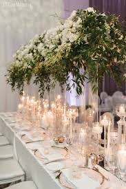 Romantic All White Wedding Reception Elegantwedding Ca White Weddings Reception Floating Candles Wedding White Wedding Table Setting