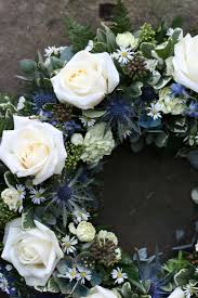Shop an assortment of thoughtful sympathy gifts and gift baskets. Cream Avalanche And Blue Thistles An Elegant Tribute For A Scottish Gentleman Funeral Floral Arrangements Flower Wreath Funeral Memorial Flowers