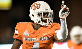 Smoke filters through the crowd after as the osu team takes the field before a college. Oklahoma State Football Preview Need To Know Season Prediction
