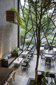 Steel Framed Cafe Becomes Hanging Garden In Vietnam Outdoor Restaurant Patio Cafe Interior Design Modern Cafe