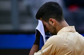 Novak Djokovic falls to Italian Open upset against Dino Prižmić after apparent stomach issues