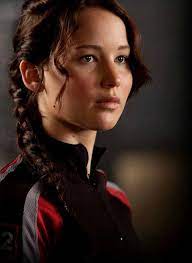 Katniss everdeen is a synonym for strength and power, so her hairstyle is just one of the things everyone got fixated on. 20 Hair Secrets From The Set Of The Hunger Games And Catching Fire