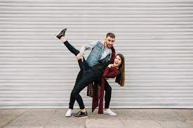 I put in cabinets and tiled the floor a few years ago. Free Photo Young Couple Having Fun In Front Of Garage