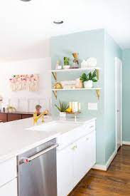 Chose taupe for kitchen accent wall, color is behr earthnut, then got bored and added metallic copper stripes!! 11 Kitchen Decorating Ideas For Your Walls The Anastasia Co Accent Wall In Kitchen Kitchen Decor Themes Small Kitchen Decor