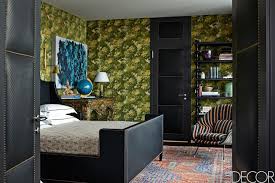 A monochromatic bedroom with a green ceiling and walls, a bed with an extended upholstered green headboard and catchy pendant lamps. 32 Green Room Ideas How To Decorate With Green Wall Paint Decor