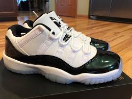 Jordan 11 Low Cut Black And White Nike Air Jordan 11 Retro Low Bg Easter Emerald Green White 528896 145 Size 7y Fashion Clothing Shoes Accessor Nike Air Jordan 11 Nike Air Jordan Boys Shoes