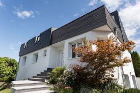 Surelevation D Une Maison En Ossature Bois Pour Une Performance Thermique Et Phonique Credit Photo Olivier Lie Surelevation Bois Maison Toit Plat Toit Plat