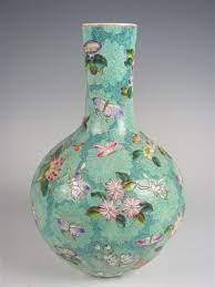 The rolled designs have the effect of enameling on a copper cast. Chinese Butterfly Vase Chinese Ceramics Chinese Pottery Porcelain Painting