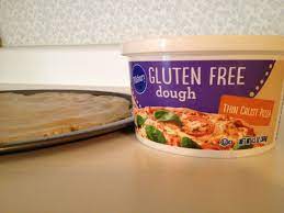 Spread pizza sauce over crust; Pillsbury Gluten Free Pizza Dough A Product Review The Food Allergy Mom