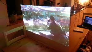 The translucent gray surface works best with a bright projector (2,000+ lumens) and narrower viewing angle/audience seating area. Home Made Rear Projection Screen Youtube