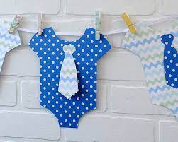 Eight Examples Of Baby Shower Themes Baby Shower Onesie Baby Boy Shower Baby Shower Banner