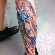 Winter cabin and snowy mountains best tattoo design ideas. Winter Skiing Style Tattoos