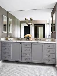 Elegant Bathroom Features A Gray Dual Sink Vanity Topped With Statuary Marble Fitted With His And Hers Si Bathroom Mirror Design Bathroom Model Bathroom Design