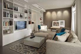 wohnzimmer mit moderner einrichtung in weiss und taupe taupe living room eclectic living room living room bookcase