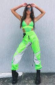 Festival outfits are the perfect way to have fun with fashion. Neon Green Trends Fashion Neongreen Fashionactiivation Womanoutfit Neon Outfits Cochella Outfits Festival Outfits Rave
