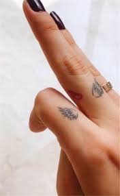 Stunning And Fantastic Angel Wings Designs You Must Try Angel Wing Tattoo Wings Tattoo Stunn Small Hand Tattoos Hand Tattoos For Women Finger Tattoo Designs
