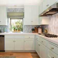 These Ocean Foam Countertops Certainly Live Up To Their Name In This Charmean Neithart Interiors Kitchen The Mi Kitchen Interior Modern Kitchen Green Cabinets