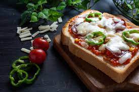 Crunchy Bread Pizza Recipe, How to Make Tasty Crunchy Bread Pizza