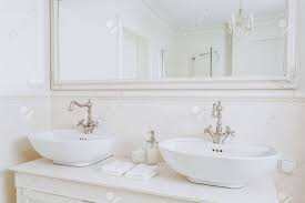 designed washbasins in retro bathroom