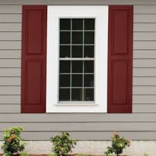 There is a single window right behind the tractor that is the same length as the double windows. Window With White Panes White Trim And Red Shutters On A Home With Beige Siding Beige House Exterior Shutters Exterior Red House Exterior