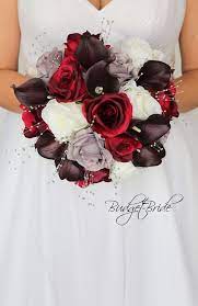 Check out bouquet and boutonniere photos from some of our past central park weddings. Burgundy Grey And Wine Wedding Flower Theme Brides Bouquet With Silver Wedding Bridal Bouquets Flower Bouquet Wedding Black Wedding Flowers