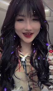 Bùi Thu Trà Con Huấn Hoa Hồng