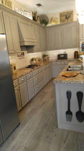 Kitchen Cabinets Painted With Reclaim Beyond Paint In Pebble Cerim Elite Gray Decorating Above Kitchen Cabinets Kitchen Cabinets Decor Above Kitchen Cabinets