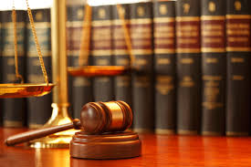 Gavel, scales of justice, and law books
