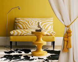 An ivory carpet and couch, taupe tables and walls, and purple accessories. Paint Trends 2021 The Colors You Need For Wonder Walls Homes Gardens