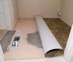 Roll Back Half Of The Vinyl Sheet Lay Down The First Half Of The Vinyl After Spreading G Vinyl Flooring Rolls Vinyl Flooring Installation Vinyl Sheet Flooring