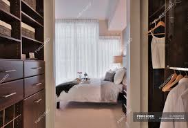 The average master bedroom dimensions were much larger, measuring 14 feet by 16 feet. Walk In Closet In Luxury Master Bedroom In Modern Apartment Building Nobody Drawers Stock Photo 254638162