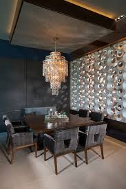 Even those who detest dinner parties and survive on takeout alone are likely to have a guest or two stop by during the holiday season, and we all know the hub of the holidays is the grub. Contemporary Wall Decor For Dining Room Novocom Top