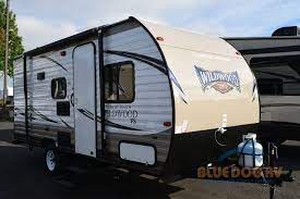 Travel trailers with bunkhouse increase sleeping capacity without taking up additional floor space. Lightweight Bunkhouse Travel Trailers 2 Great Choices For Only 12 995 Blue Dog Rv