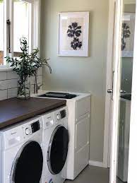 Pearson And Projects Laundry Concrete Floors Secrets Wall Robinhood Appliances White Tub Palm Print Decor Handled She Laundry Room White Tub Secret Walls