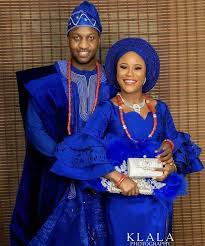 African wedding gowns are often coordinated with wedding crowns and shoes, and sometimes the groom even wears a suit that features a similar pattern and color scheme. Royal Blue African Couples Outfit African Attire African Etsy African Traditional Wedding Dress Traditional Wedding Attire African Traditional Wedding