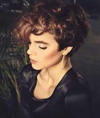 Haircut and color looks really fashionable with this pretty lady: 15 Pixie Haircuts For Curly Hair Pixie Cut Haircut For 2019