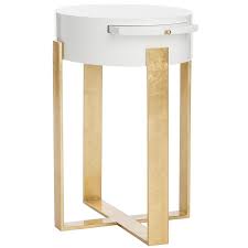 The tabletop is ideally sized to complement a sofa or armchair with a beautiful table lamp or a vase full of fresh blooms. Yaryna Round White Lacquer Side Table