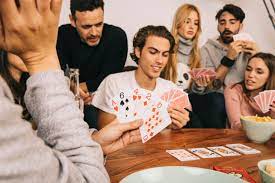 Free Photo Good Friends Playing Cards Game