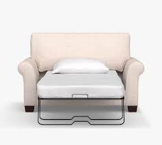 It comes in multiple colors so you can find one that coordinates with your aesthetic. Pb Comfort Roll Arm Upholstered Twin Sleeper Sofa With Memory Foam Mattress Pottery Barn