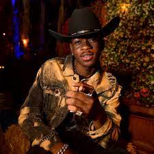 Old town road singer lil nas surprised many people when he appeared in a strapless ladies' jumpsuit in his latest photoshoot. All Of Lil Nas X S Old Town Road Remixes Popsugar Entertainment