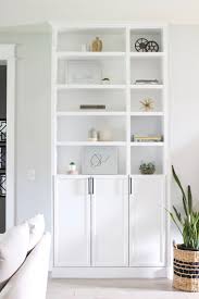 The billy bookcase is exceptionally easy to make look like a custom built in by using trim pieces and molding. Diy Built Ins Ikea Billy Bookcase Hack Designed Simple