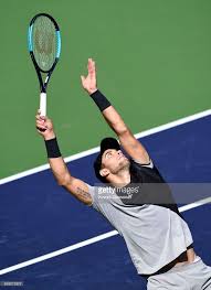Borna Coric Of Croatia Serves Against Roger Federer Of Switzerland Borna Coric Roger Federer Borna
