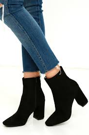 Woman legs in denim pants heels shoes outdoor. Stylish Black Suede Boots Fitted Black Booties Heeled Boots Lulus